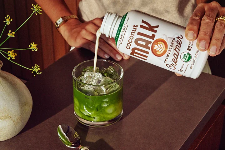 Malk pouring into matcha