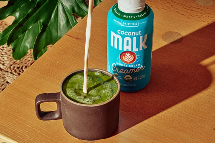 Malk creamer being poured